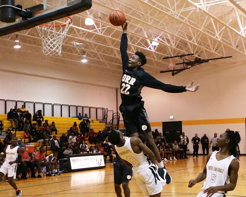 Tujautae Williams takes the ball to the basket in 2018.