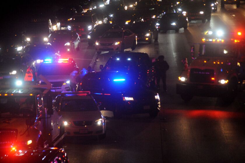 Traffic was halted after a man was shot Thursday night while traveling in the westbound lanes of the Eisenhower Expressway. | Justin Jackson/Sun-Times