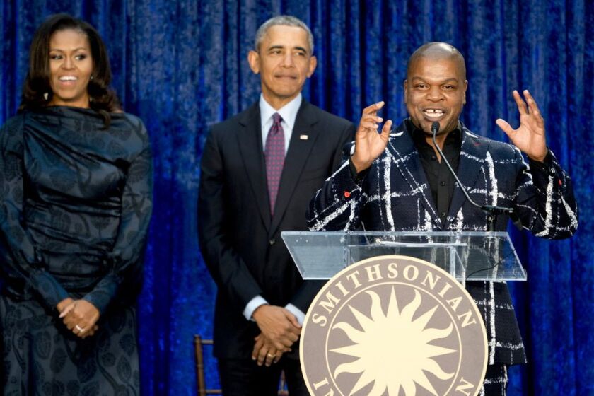 Former President Barack Obama and former first lady Michelle Obama watch as artist Kehinde Wiley (right) speaks during an unveiling ceremony for the Obamas portraits at the Smithsonian’s National Portrait Gallery, on Monday, Feb. 12, 2018, in Washington.