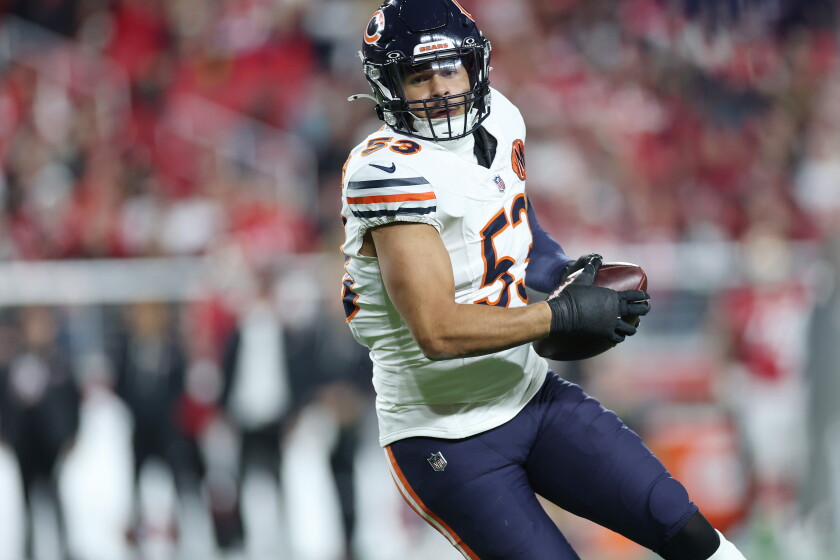 T.J. Edwards #53 of the Chicago Bears intercepts a pass and runs it back for a touchdown against the San Francisco 49ers during the first quarter of the game at Levi's Stadium on December 28, 2025 in Santa Clara, California.