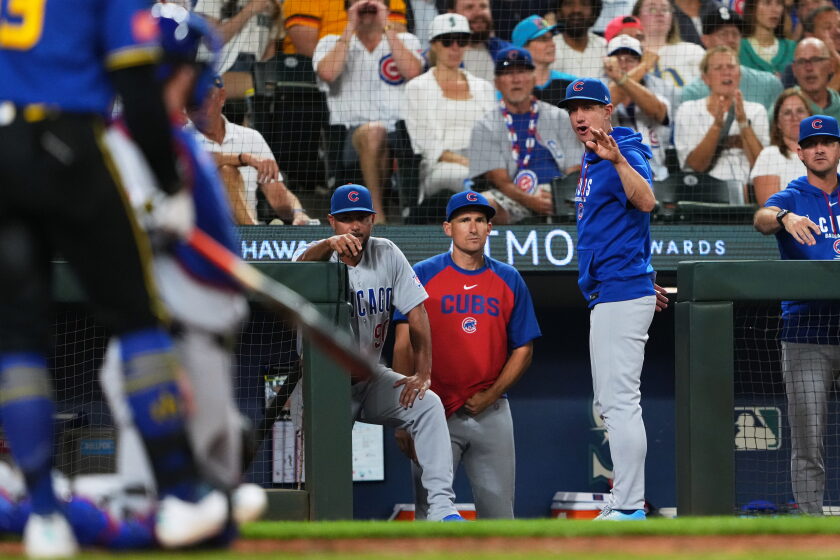 Cubs manager Craig Counsell reacts from the dugout after starting pitcher Matthew Boyd was called for a balk during a game against the Mariners on Aug. 21.