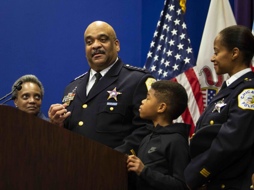 With Mayor Lori Lightfoot, his 10-year-old son and his wife looking on, Chicago Police Supt. Eddie Johnson announced his retirement Thursday, Nov. 7, 2019.