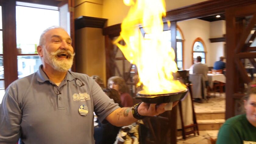 Flaming saganaki at Greek Islands Restaurant in Greektown. | Brian Rich/ Sun-Times