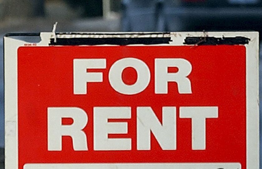A “For Rent” sign.