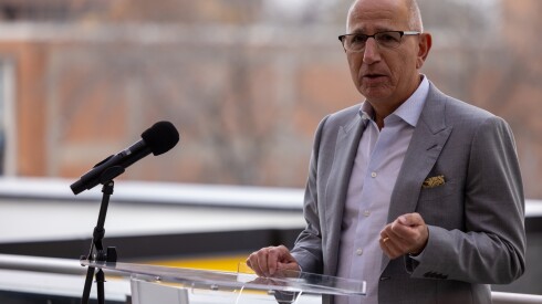 Brinshore cofounder Richard Sciortino speaks at a November ribbon cutting for the new Westhaven Park Station apartment building near the United Center.