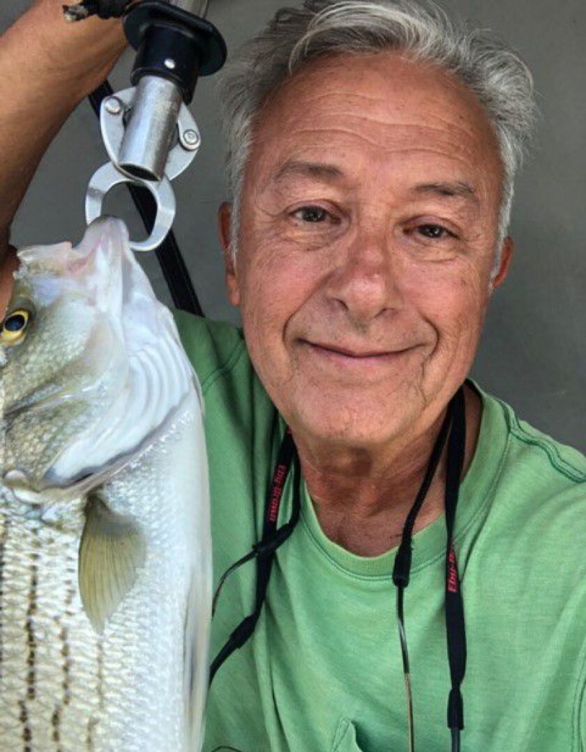 Louis Morteo with one of the many and varied good fish he caught at Heidecke Lake. Provided photo