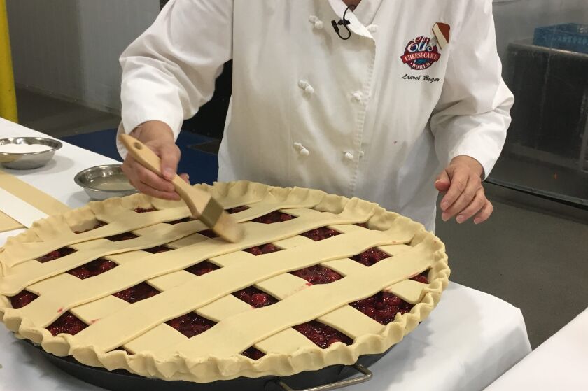 A clear, flavorless glaze is brushed across the top of the pie, which is then topped with a sprinkling of granulated sugar and baked. | Miriam Di Nunzio/Sun-Times