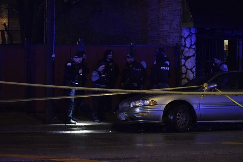 Police investigate after two men were shot Feb. 1, 2020, in the 200 block of North Pulaski Road.