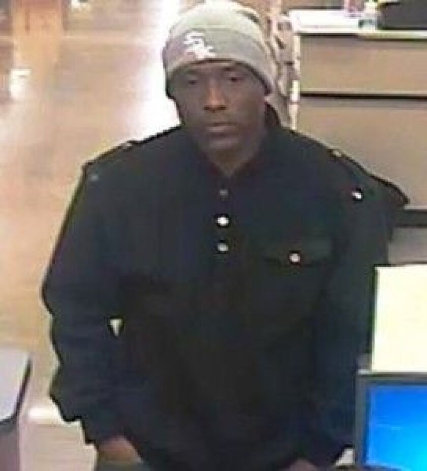 Surveillance photo of the man suspected of robbing a Guaranty Bank branch March 21 in West Englewood. | FBI