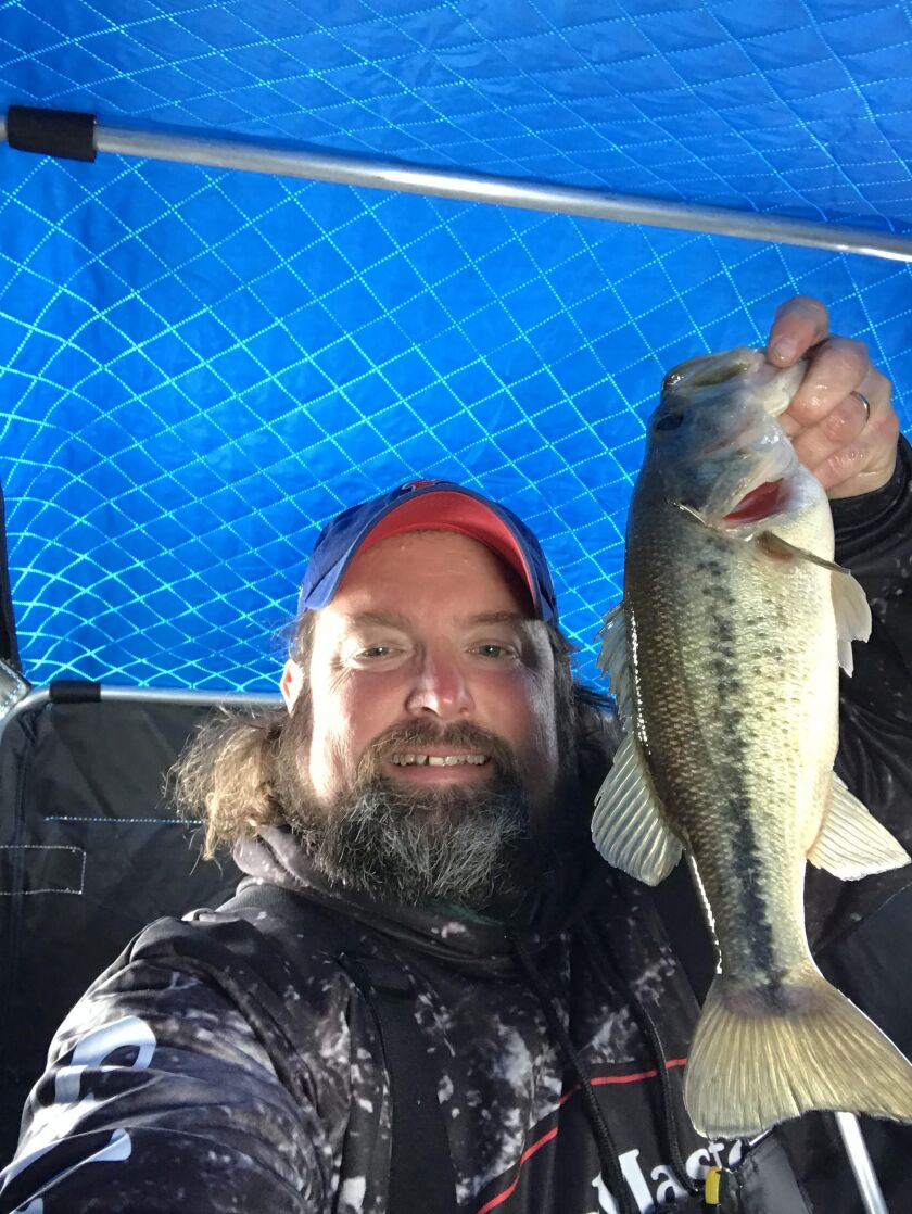 Ken “Husker” O’Malley with a late-season largemouth bass. Provided photo