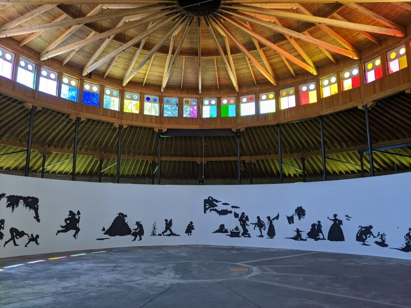 Installation view, Kara Walker: “Presenting Negro Scenes Drawn Upon My Passage through the South and Reconfigured for the Benefit of Enlightened Audiences Wherever Such May Be Found, By Myself, Missus K.E.B. Walker, Colored,” at the DuSable Museum of African American History, 2021. Photo by Martin Giese, DuSable Museum of African American History