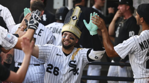 Chicago White Sox catcher Edgar Quero, wearing a pope hat, celebrates a home run with teammates during the White Sox vs. Cincinnati Reds game at Rate Field on Aug. 11, 2026.