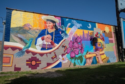 A mural by Fernando Lechón honors indigenous Ecuadorian culture.