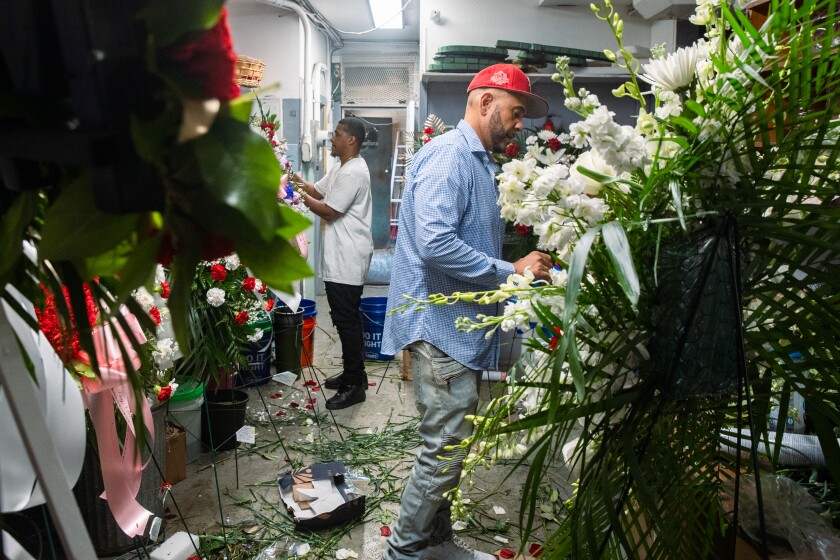 Marek Fortineaux (Genuine), Proprietor of Leo's Metropolitan Florist, work on an diagram in his store in Increased Broad Crossing, Thursday, Aug. 28, 2025 .. | Zubaer Khan/Sun-Time