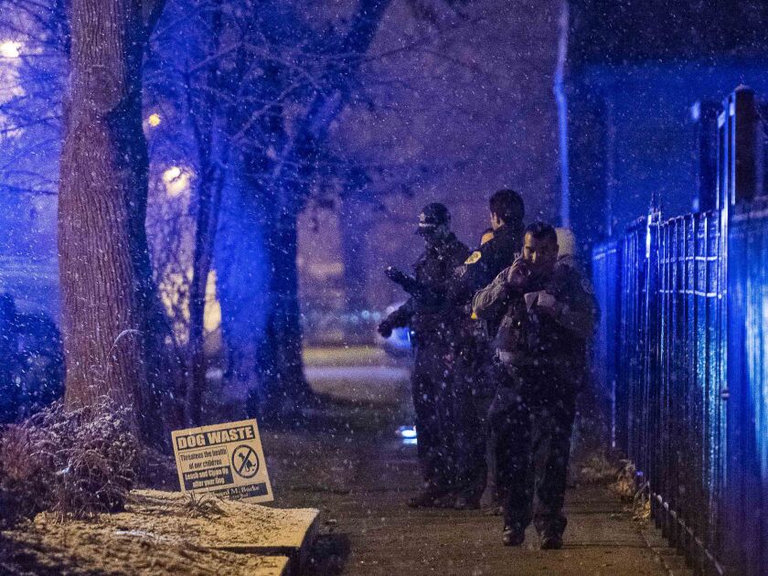 Chicago police and fire department respond to the scene of a person shot and killed Sunday morning in the 5200 block of South Artesian, in the Gage Park neighborhood. | Tyler LaRiviere/Sun-Times