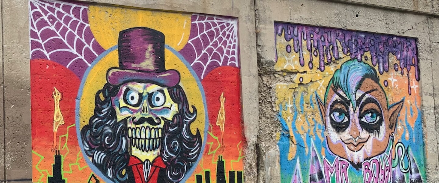 The mural on the left, done by 29-year-old Logan Square artist Natalia Sustaita, features Chicago “horror show icon” Svengoolie. “I watched him growing up . . . spooky stuff like that I like,” says Sustaita, who goes by n.susta for her art. The mural to the right was by South Side artist Squeak Starzula. “I chose to do my good friend Bobby Hernandez, AKA ‘Mr. Bobby,’” a DJ and an events organizer “who is a huge importance to the underground art and music scene of Chicago and beyond,” she said.