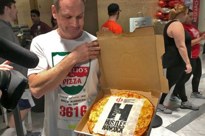 <small><strong> Aurelio’s Pizza CEO Joe Aurelio before delivering a pizza to the top of the Hancock Building in an attempt to gain a place in the Guinness Book of World Records. | Mitch Dudek/Sun-Times</strong></small>