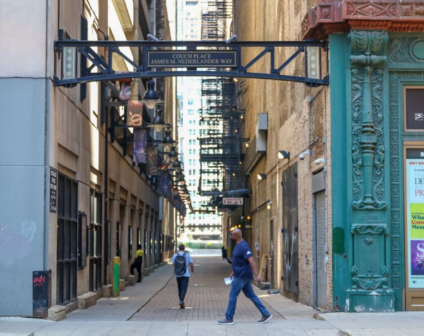 The Couch Place alley between Dearborn and State hosts several murals featured on the self-guided Chicago Loop Alliance mural tour. | Kate Scott/for the Sun-Times