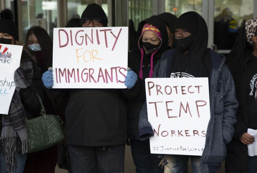 Community groups celebrate immigrant worker protections expected to be implemented next month by the U.S. Department of Homeland Security on Thursday, Nov. 18, 2021.