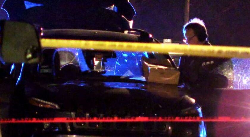 Multiple bullet holes can be seen in the vehicle where 2 people were killed on the 4700 block of Arthington. | Justin Jackson