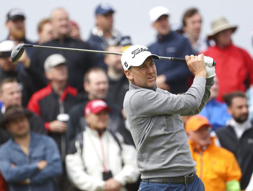 England’s Ian Poulter plays a shot off the 9th tee during the second round of the British Open Golf Championship. | Peter Morrison/Associated Press