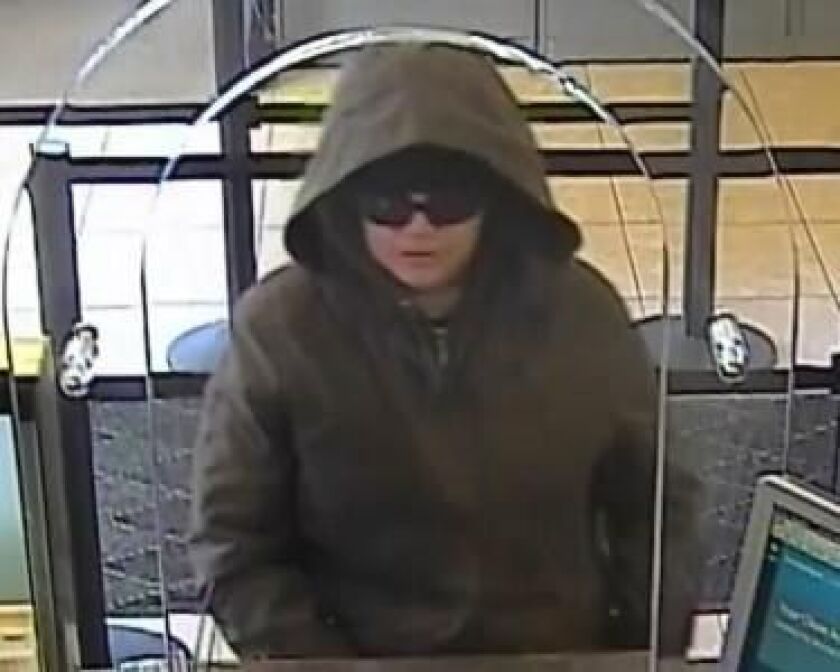 Surveillance image of the suspect in a robbery Feb. 15 at the Chase Bank branch at 1959 W. Division St. | FBI