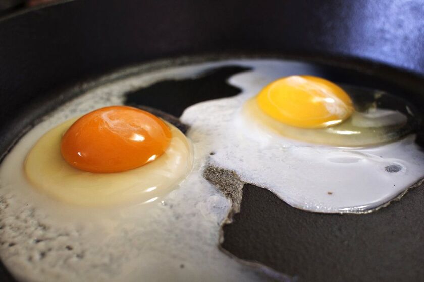 Yolk color is primarily determined by the carotenoids — naturally occurring pigments in plants — that hens eat, according to Elizabeth Bobeck, a poultry nutrition professor at Iowa State University. | Pete Rodman/Gillette News Record via AP