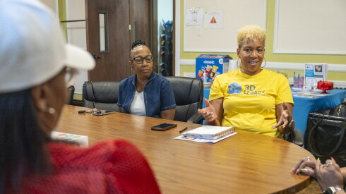 Dana Bryant speaks with other parents of autistic children at a support group.