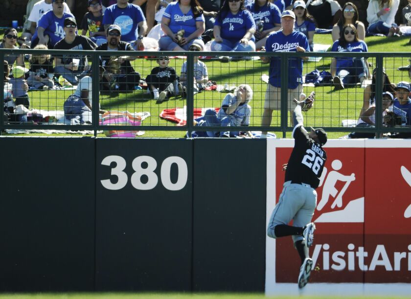 <em>Avisail Garcia can’t catch a double hit by Los Angeles Dodgers’ Logan Forsythe during the third inning.</em>