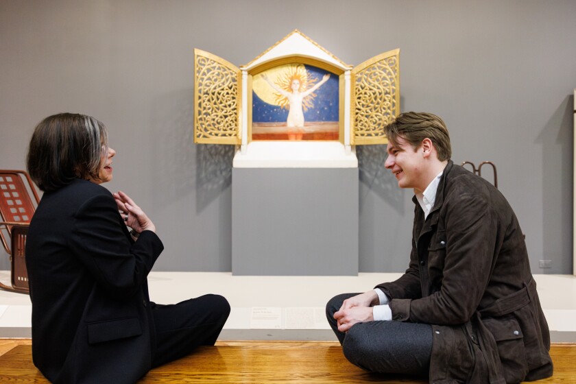 Rebecca J. Long, Patrick G. and Shirley W. Ryan Curator, (left) and Klaus Makela, Music Director of the CSO, speak about “Ad astra (To the Stars)” by Akseli Gallen-Kallela at the Art Institute of Chicago, Tuesday, Feb. 17, 2026.