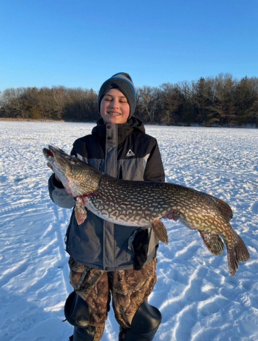 Dawson Kelm, 13, caught and released this northern pike at the Kingston, Wisconsin, mill pond. Provided by Mike Norris
