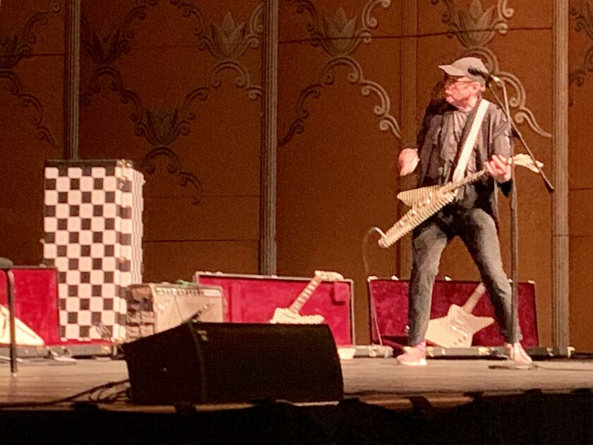 Cheap Trick guitarist Rick Nielsen performs before a presentation touting the Hard Rock Casino Rockford in 2019.
