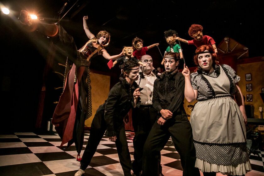 Ellen DeSitter (on stilts, from left), Kat Evans, Anthony Whitaker, Genevieve Lerner and Caitlin Jackson in Black Button Eyes Productions’ “Shockheaded Peter.” (Photo: Cole Simon)