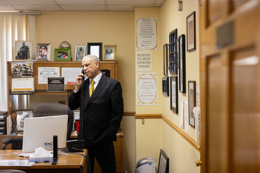 Spencer Leak Jr. takes a phone call in his office.