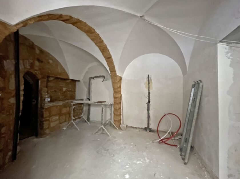 The home in Sambuca, Sicily, that Meredith Tabbone bought without seeing it in person cost $6,000 in an online auction. The Chicago woman has since spent about $120,000 on renovations and on an adjoining property.