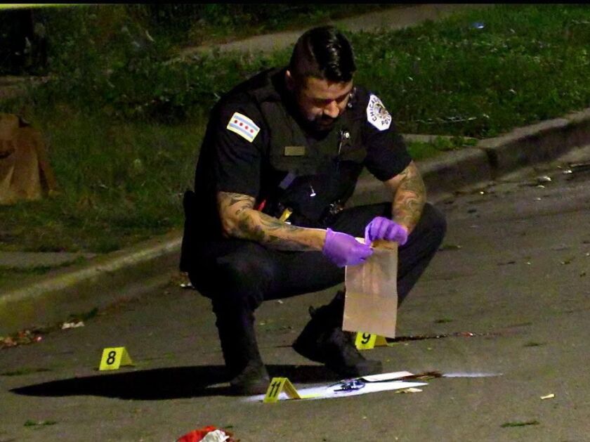 Police investigate a shooting about 12 a.m. Wednesday, July 18, 2018 in the 6700 block of South Winchester Ave in Chicago. | Justin Jackson/ Sun-Times
