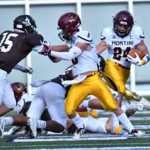 Montini’s Nick Fedanzo (24) comes out of the back field. Worsom Robinson/For the Sun-Times.