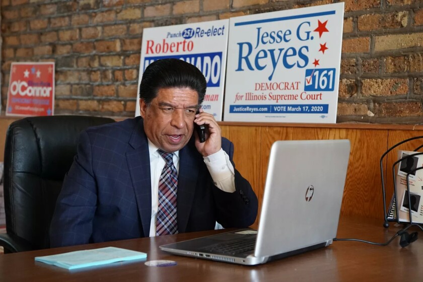 Appellate Justice Jesse G. Reyes making calls on Election Day, Tuesday March 17, 2020. 