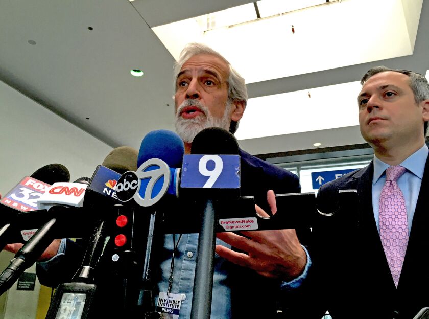 Jamie Kalven and his attorney, Matt Topic, talk to reporters after Wednesday’s hearing. | Andy Grimm/Sun-Times