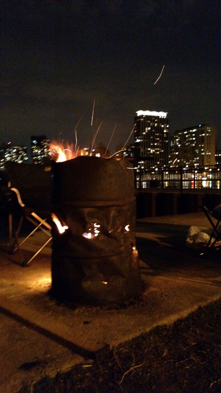 A study in at Belmont Harbor Saturday on opening night of smelt netting on the Chicago lakefront.<br>Credit: Dale Bowman