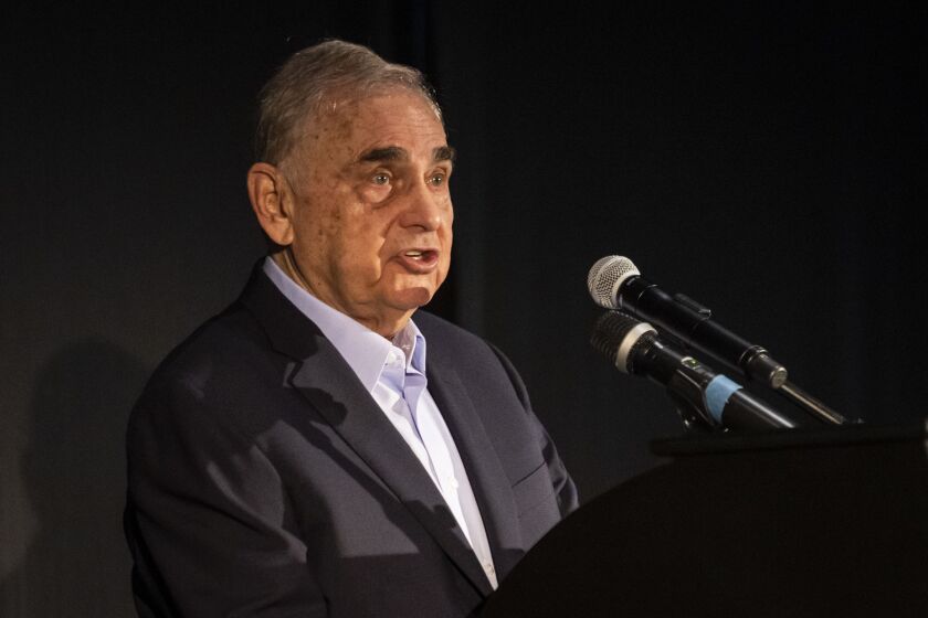 Neil Bluhm, chairman of Rivers Casino, speaks during the public opening of BetRivers Sportsbook, the first brick-and-mortar sportsbook approved by the Illinois Gaming Board, on March 9.