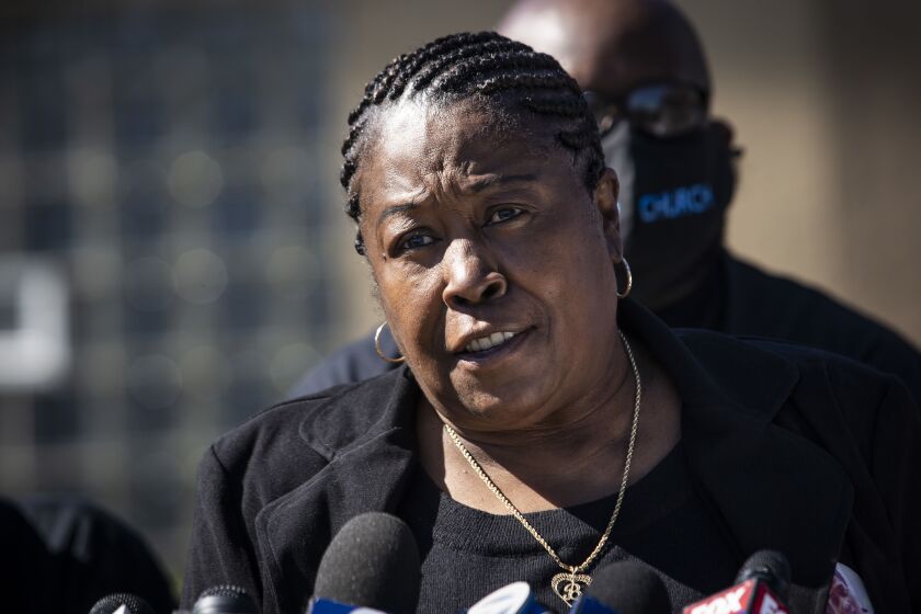 Beatrice Roberson speaks during a news conference Friday shortly after Cook County State’s Attorney Kim Foxx’s office announced that charges would not be filed in connection with the fatal shooting of her son, Jemel Roberson.