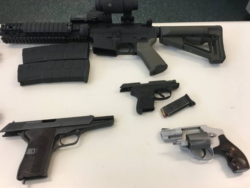 Guns recovered during a parole compliance check Nov. 7 at a home in Aurora. | Aurora police