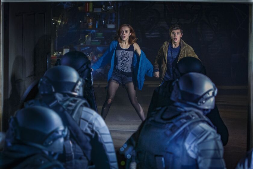 Olivia Cooke and Tye Sheridan play the young heroes of “Ready Player One.” | WARNER BROS.
