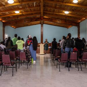 Alexa Ramírez, far right, during a religious ceremony at a church in the state of Oaxaca, Mexico.
