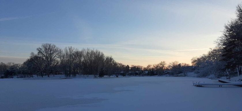 A winter scene on Island Lake, where there was 4 inches of ice and building. Credit: Rob Abouchar
