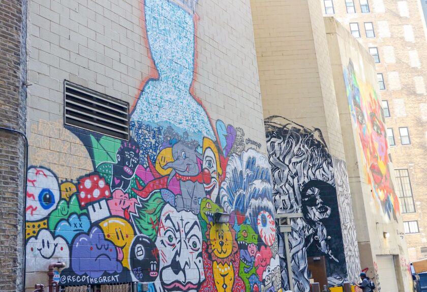 Murals, such as this one titled “King’s Ransom” by artist Reco the Great and Barrett Keithley, featured on the Northeast Loop route of the Chicago Loop Alliance self-guided murals tour are tough to find but worth the search. | Kate Scott/for the Sun-Times