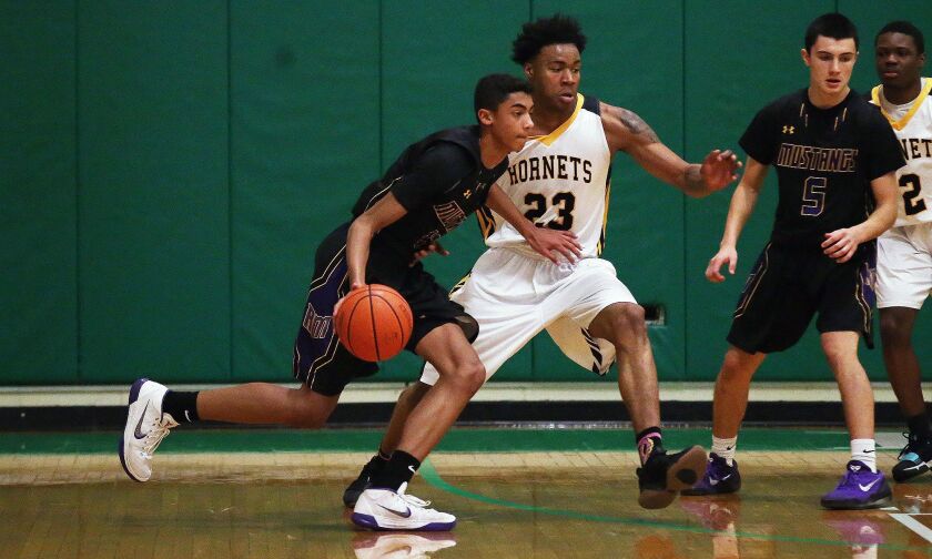 Rolling Meadow’s Max Christie controls the ball as Hinsdale South’s Zion Griffith defends. Allen Cunningham/For the Sun~Times.