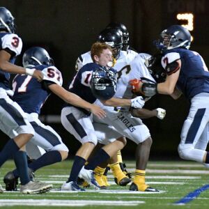 Payton’s Julian Melchor (10) tackles Clark’s Artez Kilgore. Worsom Robinson/For the Sun-Times.