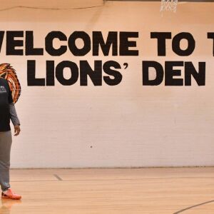 Leo assistant coach Fred Cleveland Sr. talks to the team during practice. Worsom Robinson/For the Sun-Times.
